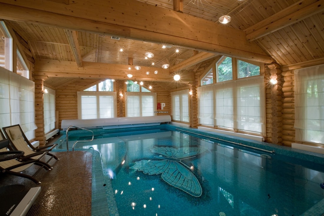 Wooden houses with swimming pools