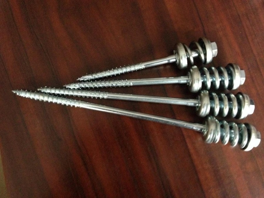 Spring-type fastening “SILA” for the construction of wooden houses