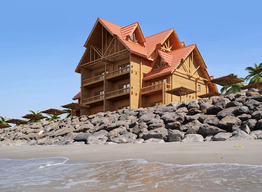 Wooden hotel by the sea from round logs   